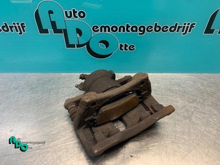 Remklauw (Tang) links-voor van een Nissan Micra (Micra 03-), Gebruikt, -, -, Ophalen of Verzenden