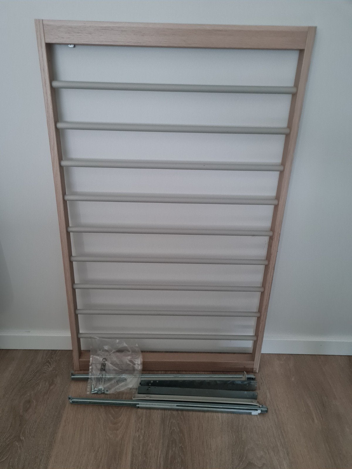 ikea uittrekbare broekenhanger voor paxkast, Ophalen