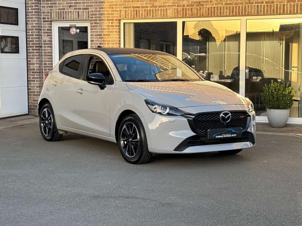 Mazda 2 1.5 SKY-G HOMURA / Automaat / 11000km, 4 cilinders, 5 zetels, Zilver of Grijs, 66 kW
