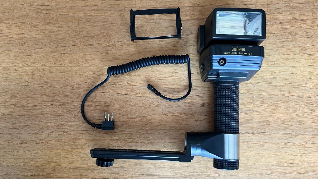 Flitser voor fototoestel Sunpak auto 455 thyristor, Ophalen of Verzenden, Gebruikt, Overige merken, Kantelbaar