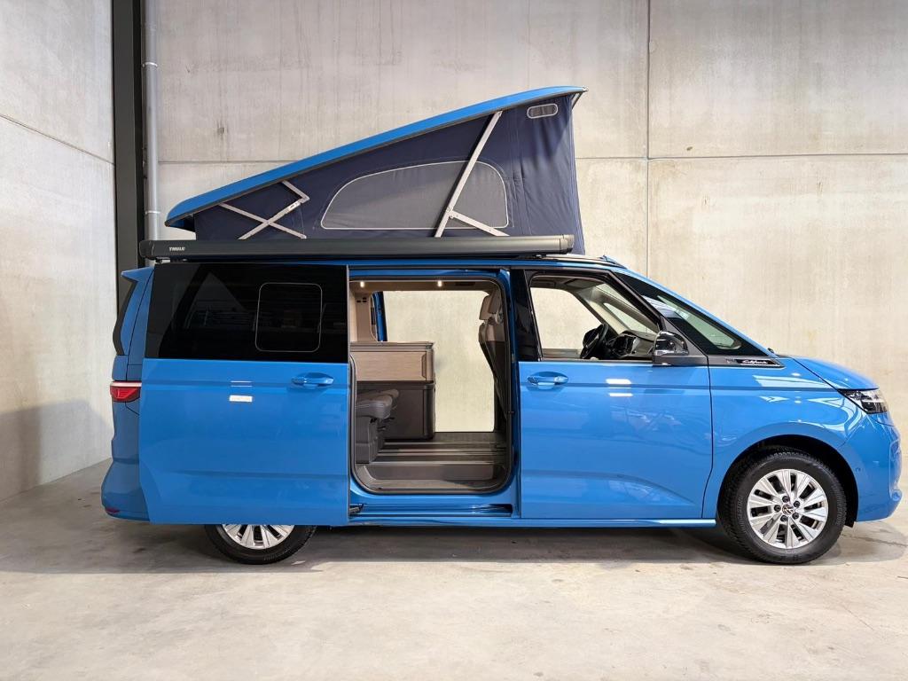 VW California T7 Ocean Florida Blue *** Fabrieksgarantie ***, Caravanes & Camping, Camping-cars, Entreprise, jusqu'à 4, Modèle Bus ou Fourgon aménagé
