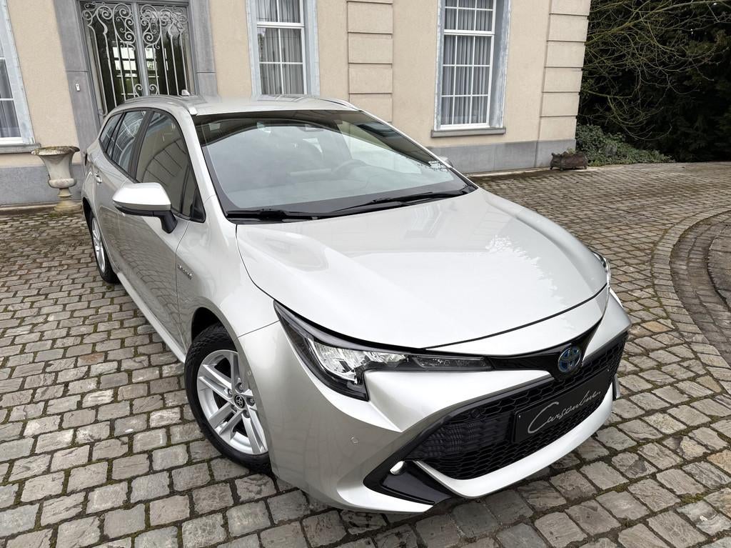 Toyota Corolla SW Hybrid 1.8 Dynamic Plus e-CVT Camera, Gara, Automaat, 78 g/km, Stof, Gebruikt