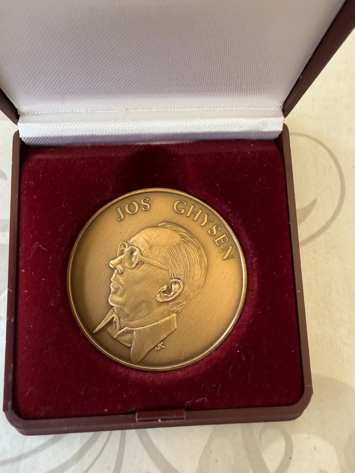 Medaille, Ophalen