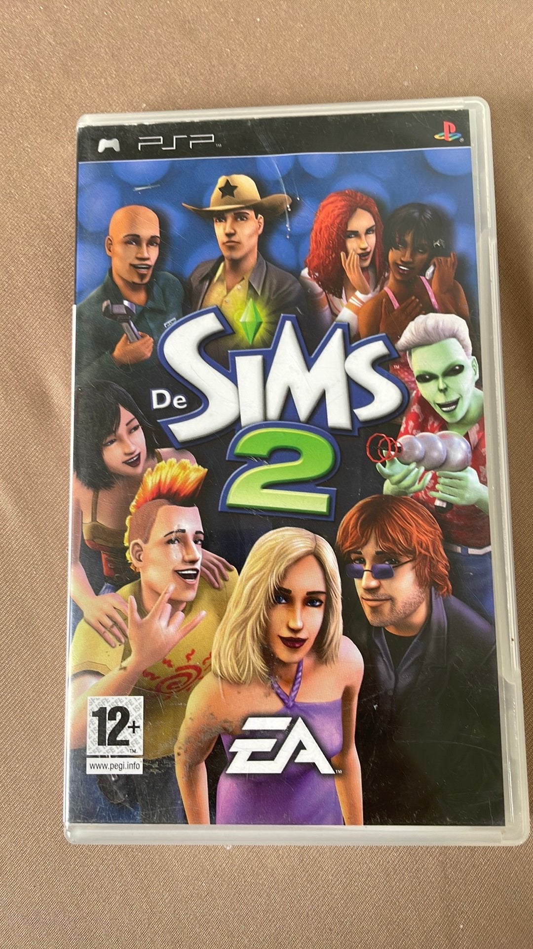 Sims 2 psp zo goed als nieuw met handleiding, Games en Spelcomputers, Games | Sony PlayStation Portable, Ophalen of Verzenden