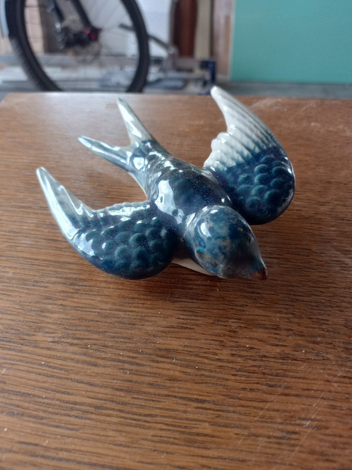 Porseleinen beeldje vogel, Ophalen