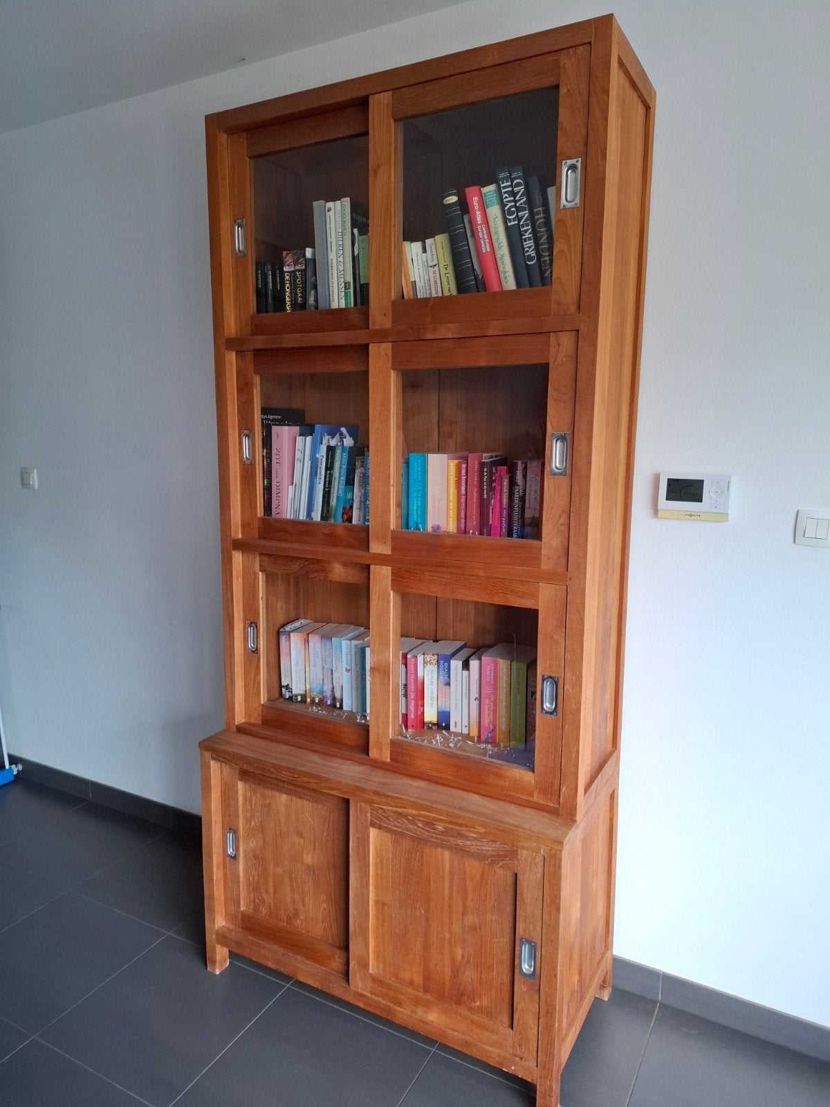 kast teak, Enlèvement, Teck