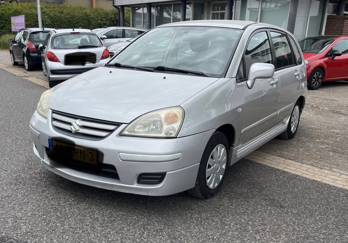 Suzuki liana 1400 did 115000 km gekeurd, Auto's, Stof, Zwart, 4 cilinders, 65 kW