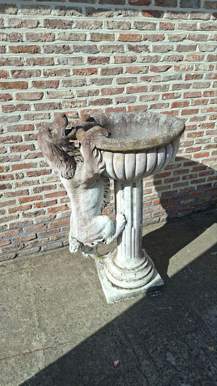 beton tuinbeeld, Ophalen