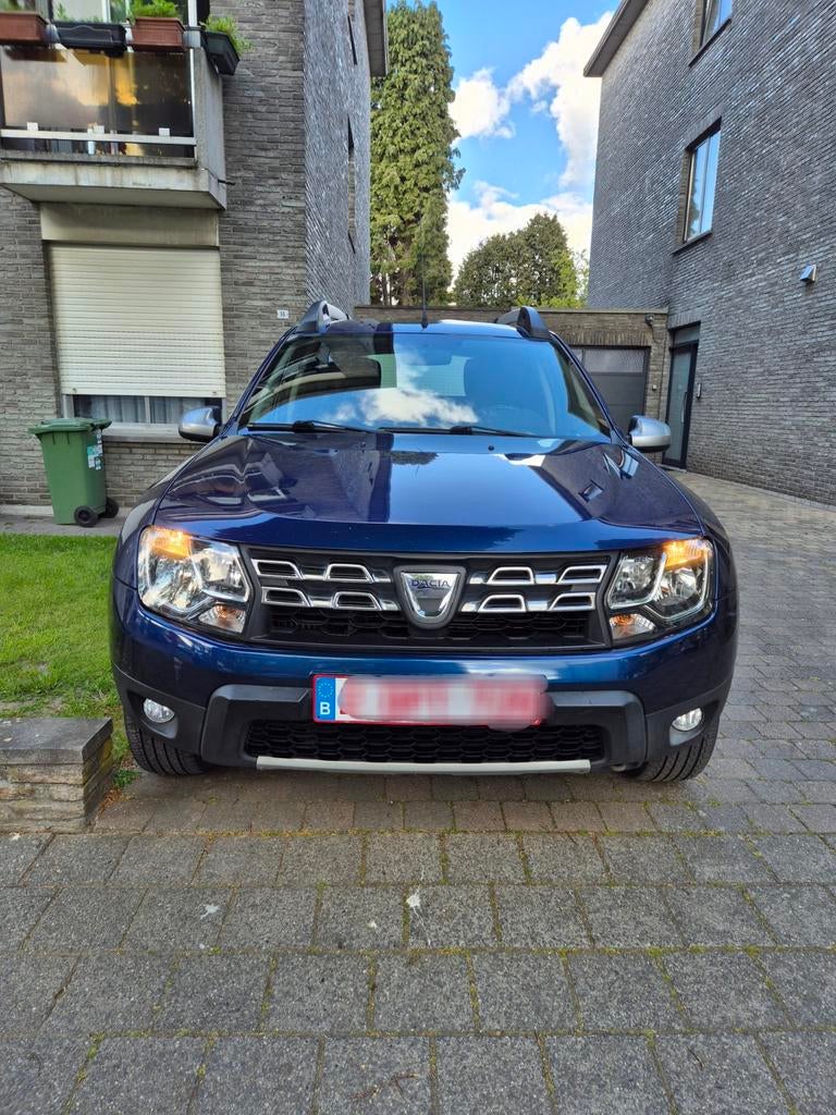 Dacia Duster 1.2i  Suv 2016 Euro 6b Gekeurd/Carpass, Auto's, Stof, Euro 6, Duster, Blauw