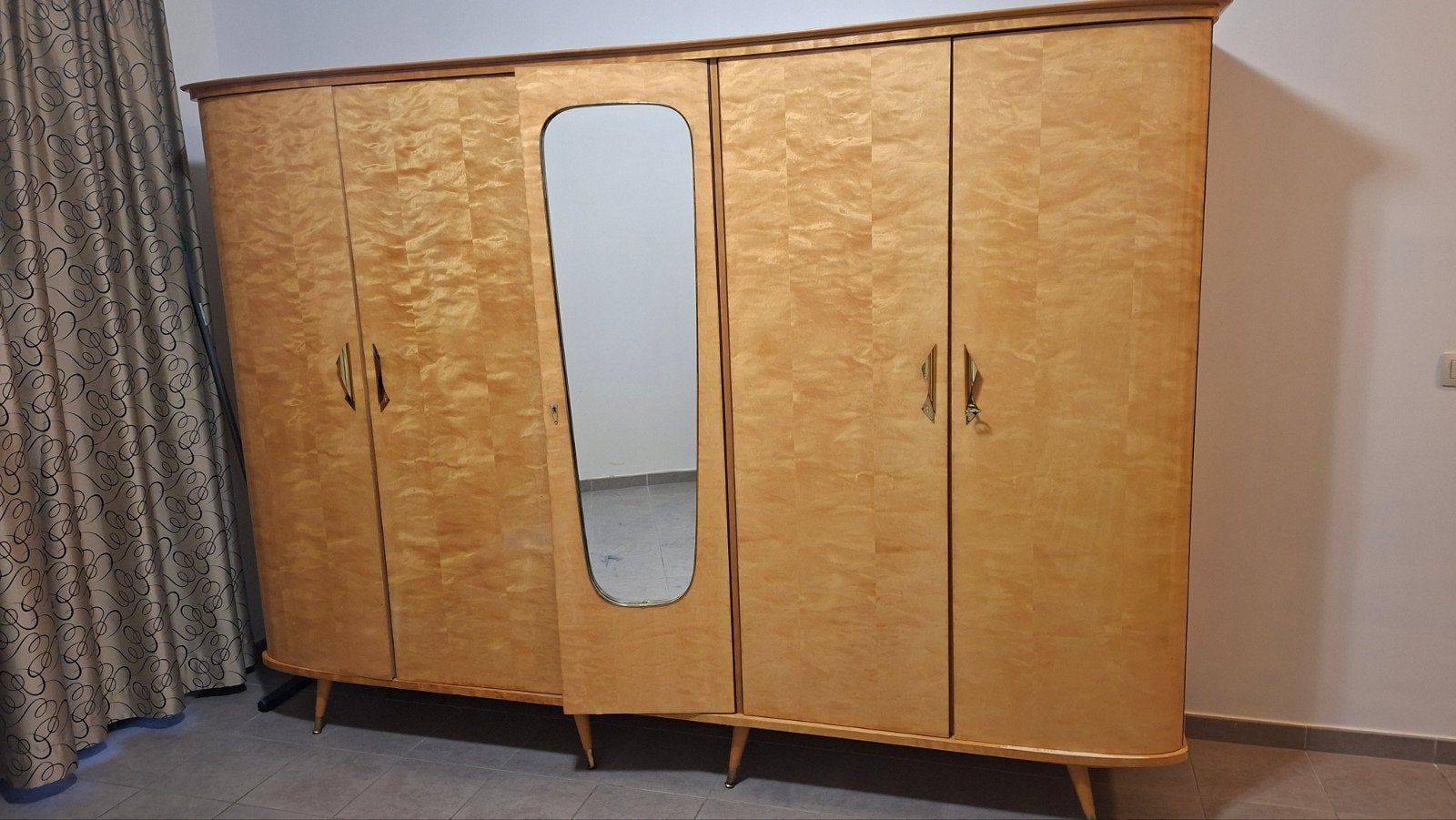 vintage kleerkast, Enlèvement