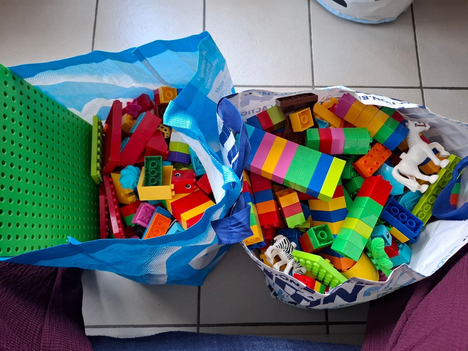 2 volle zakken met duplo, Ophalen