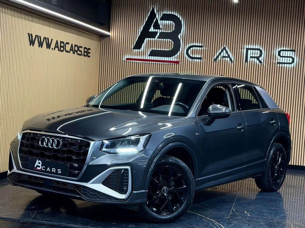 Audi Q2 30 TFSI S line * 1ER PROPRIÉTAIRE * GAR 12 MOIS, 116 g/km, Gebruikt, Lichtsensor, Bedrijf