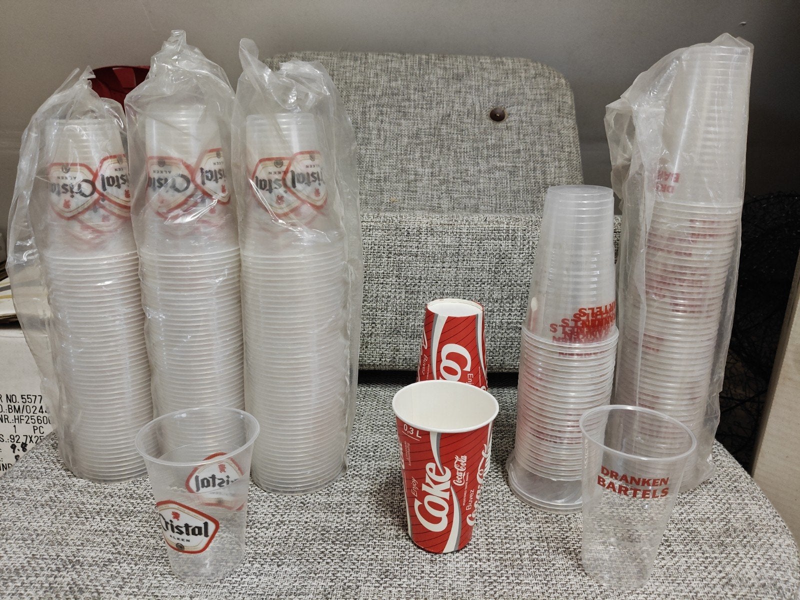 plastic bekers, Ophalen