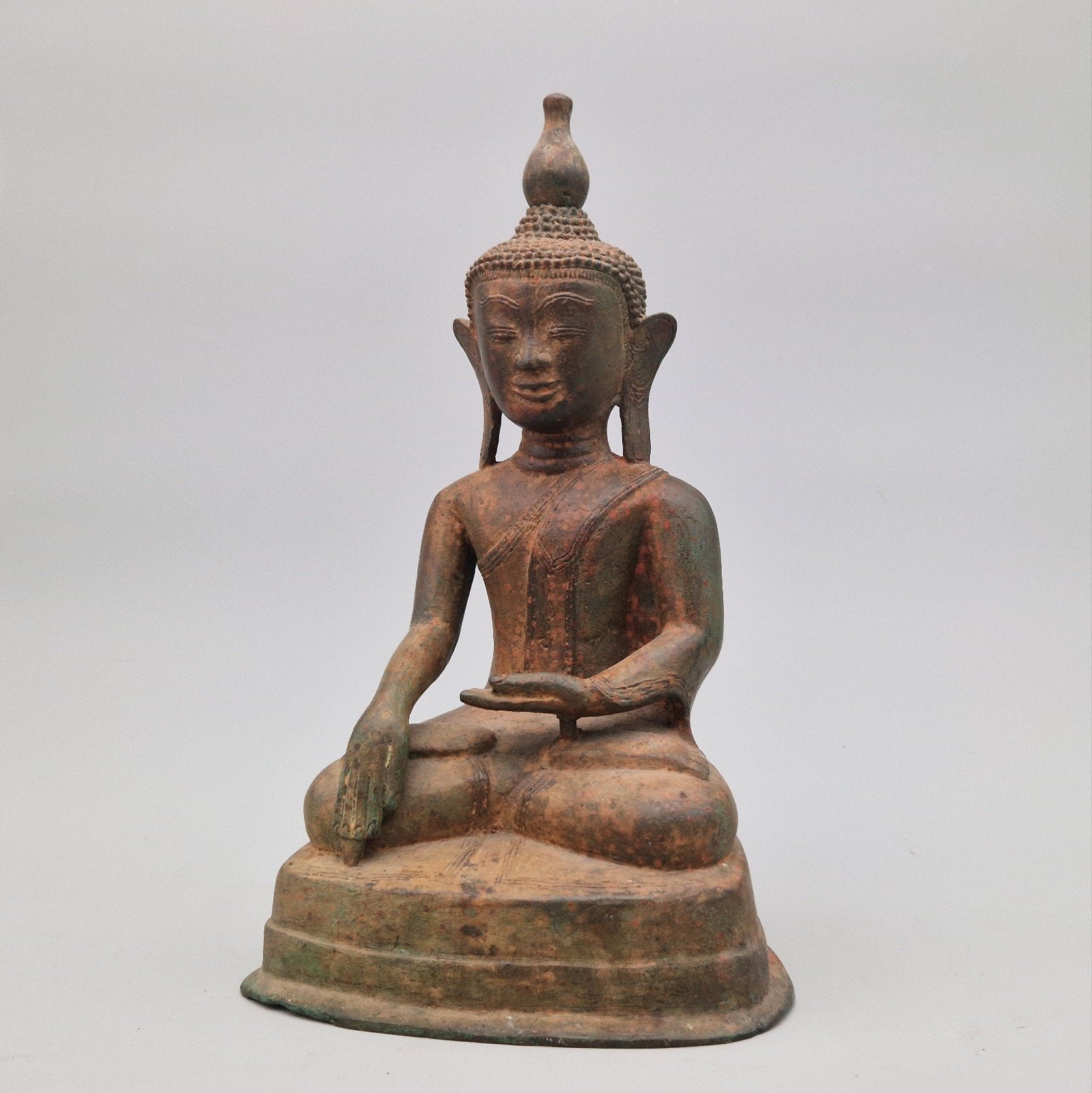 Bouddha birman shan en bronze, Enlèvement