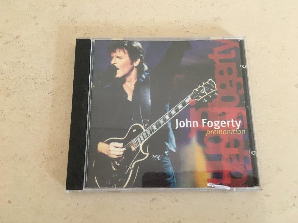 CD van John Fogerty - Premonition, Enlèvement ou Envoi