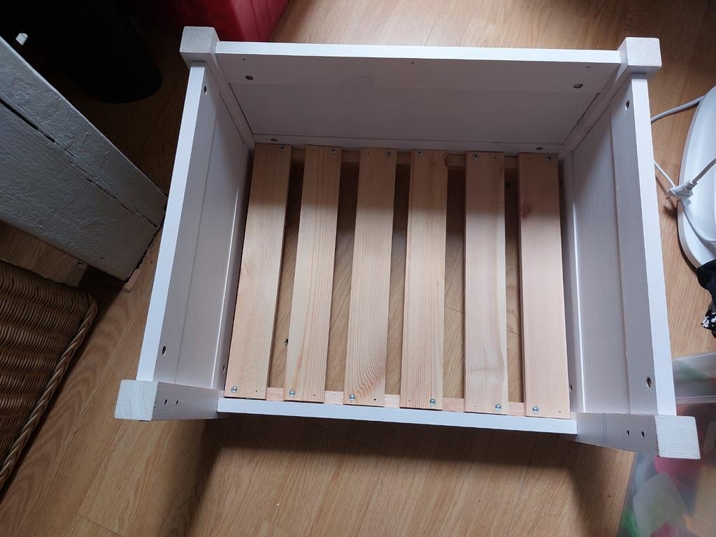 Wit hondenbed., Ophalen