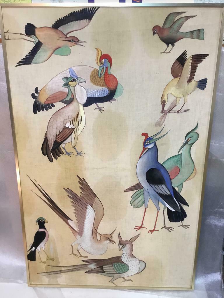 Schilderij op stof met afbeeldingen van vogels.