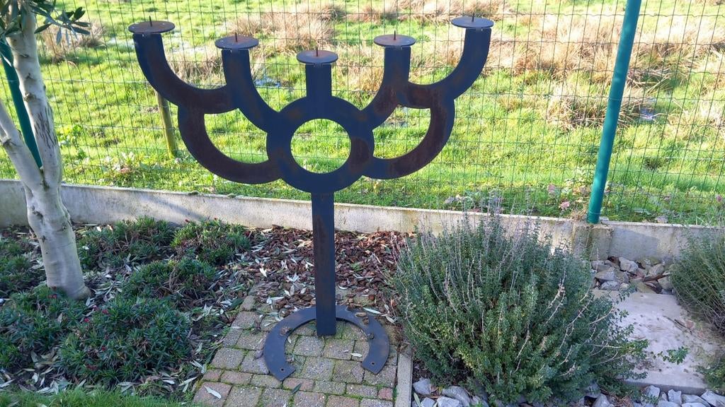 Ijzeren kandelaar, Ophalen