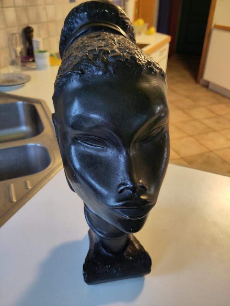 Sculptuur van afrikaans hoofd, Ophalen