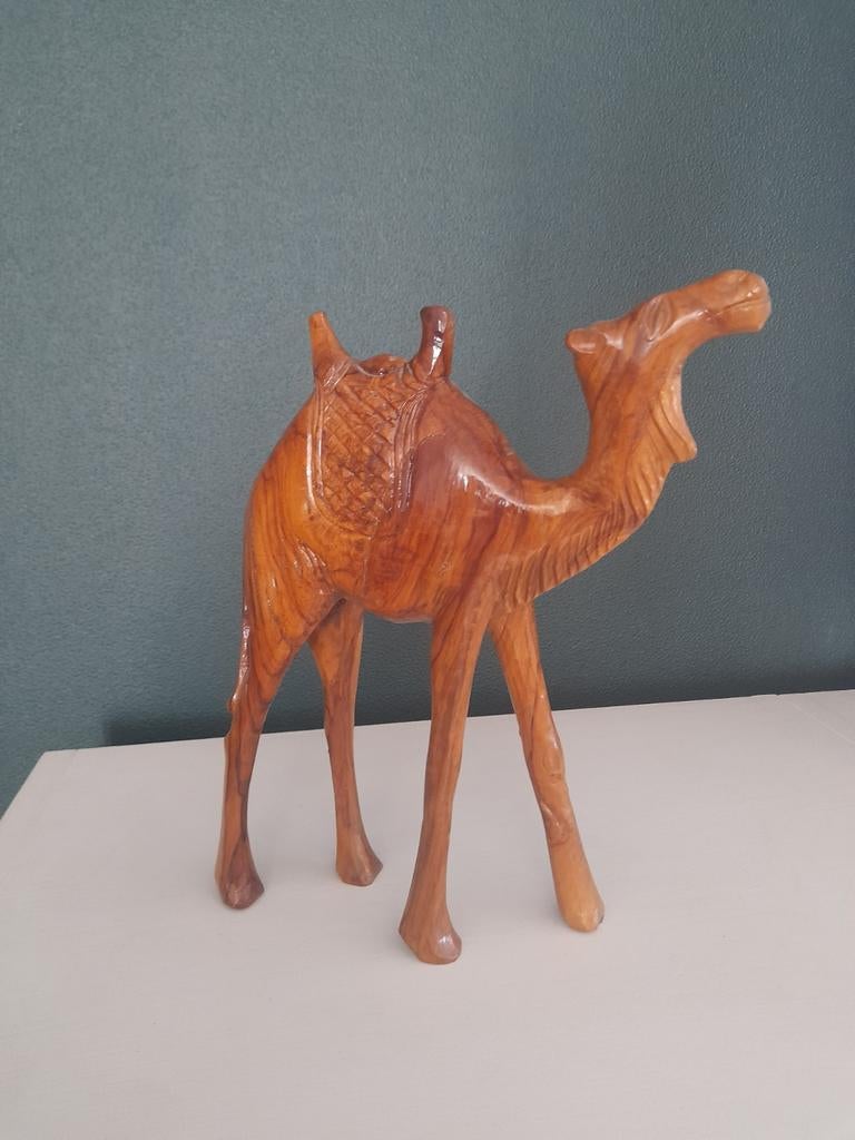 Houten kameel, Ophalen