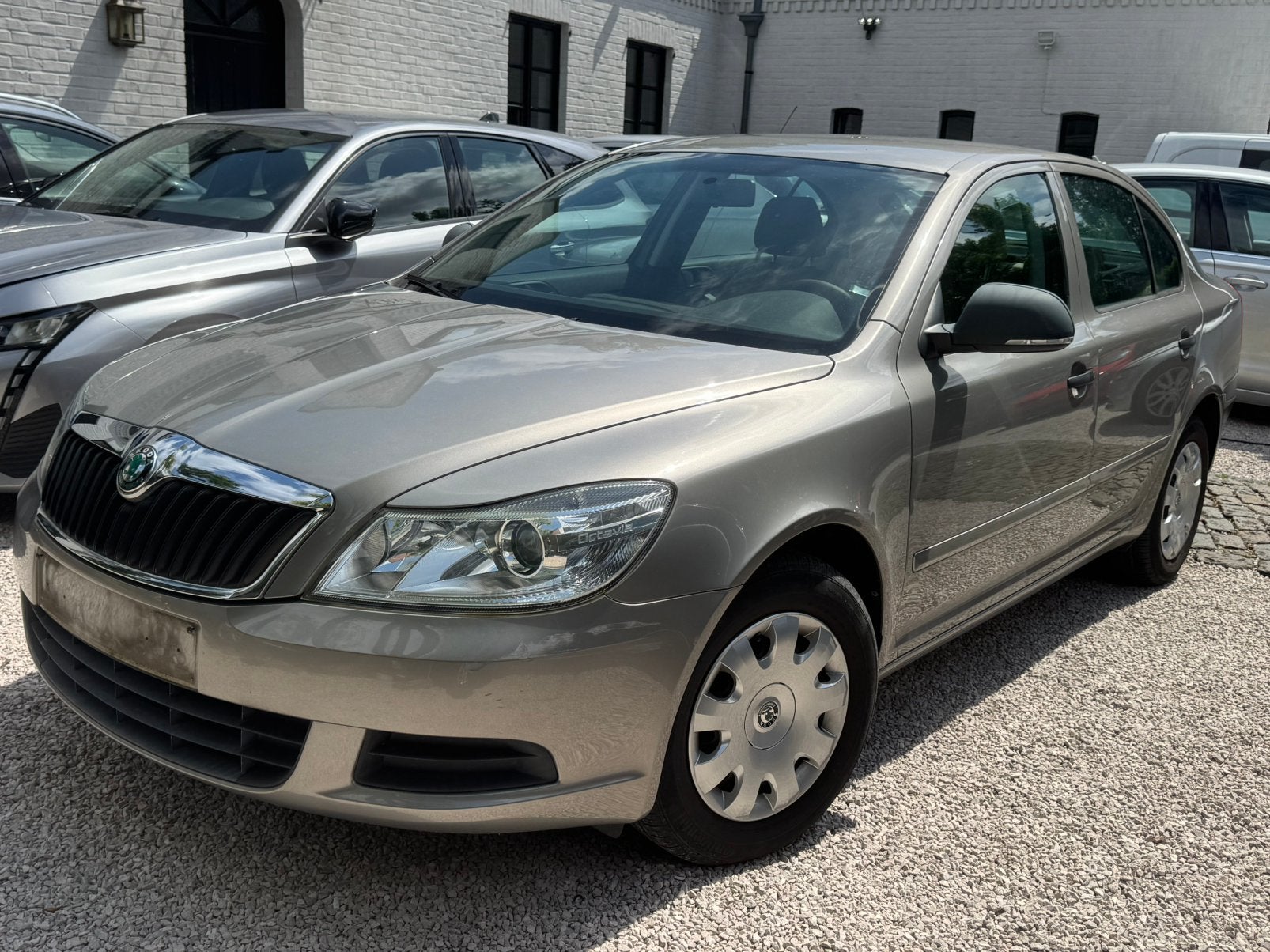 Skoda Octavia 1.2i benzine - 2011*Airco*Trekhaak*44000KM!, Auto's, Voorwielaandrijving, Beige, https://public.car-pass.be/vhr/07759503-8560-40b9-8355-23ce0be82d23