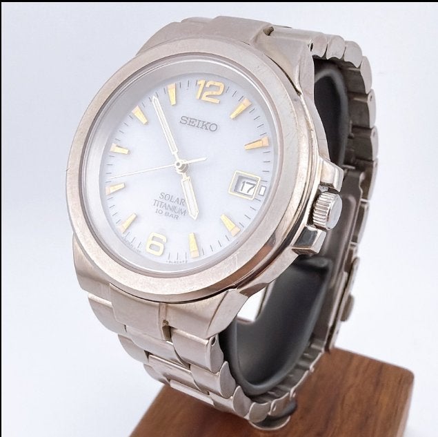 SEIKO SOLAR TITANIUM, Handtassen en Accessoires, Horloges | Heren, Gebruikt, Polshorloge, Overige materialen, Ophalen of Verzenden