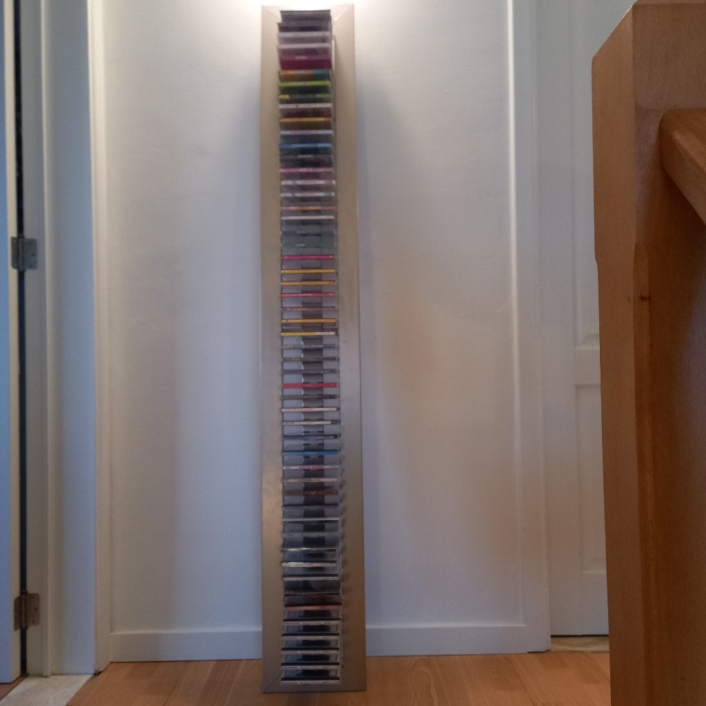 metalen cd-rek gevuld met 48 enkel cd's + 4dubbel cd's., Huis en Inrichting, Woonaccessoires | Cd- en Dvd-rekken, Ophalen, Zo goed als nieuw