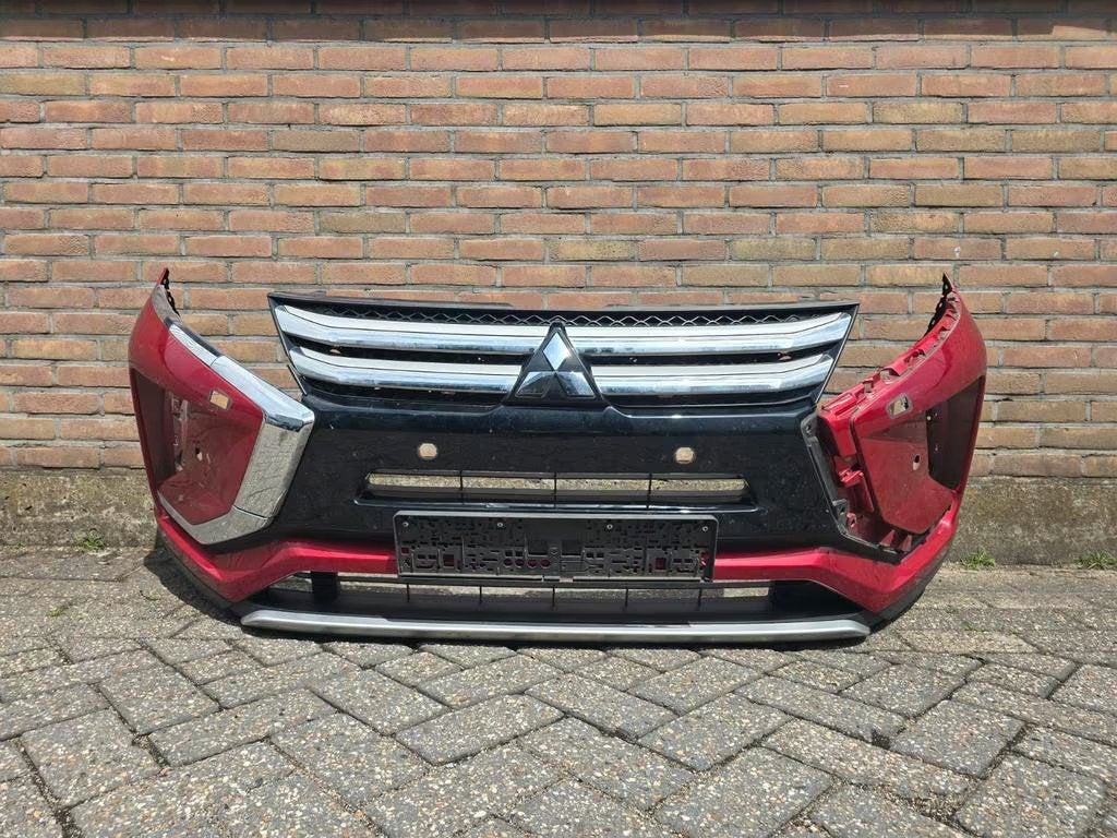 Mitsubishi Eclipse Cross 2017-2023 Voorbumper Bumper 4xPDC K, Info@mitsubishi-motors.com, Gebruikt, Mitsubishi Motors Corporation