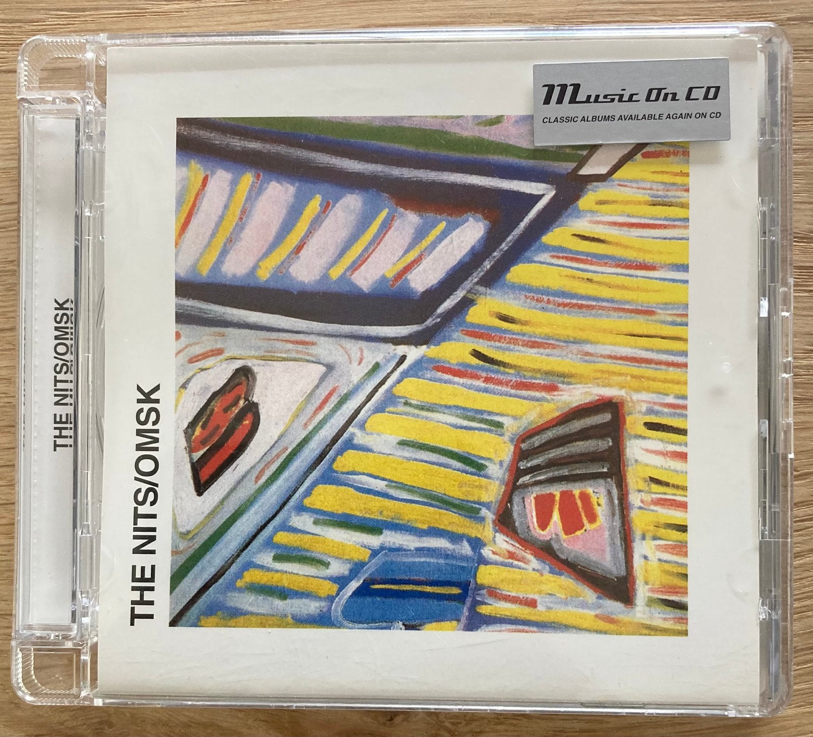 The Nits - Omsk, Cd's en Dvd's, Cd's | Rock, Ophalen, Inclusief boekje, Zo goed als nieuw, Indie Rock