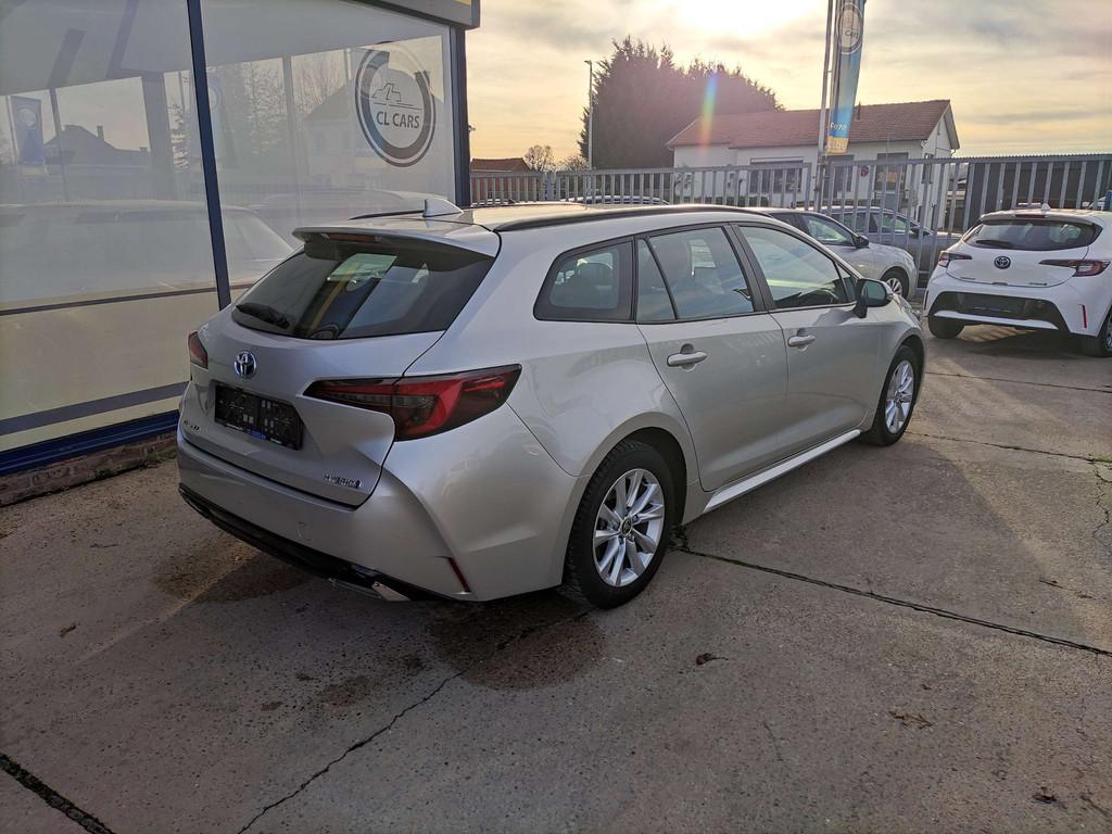 Toyota Corolla 1.8 Hybrid Touring/Automaat/Navi/Camera/Cc/Bt, Auto's, Toyota, Automaat, Stof, Gebruikt, 1885 kg