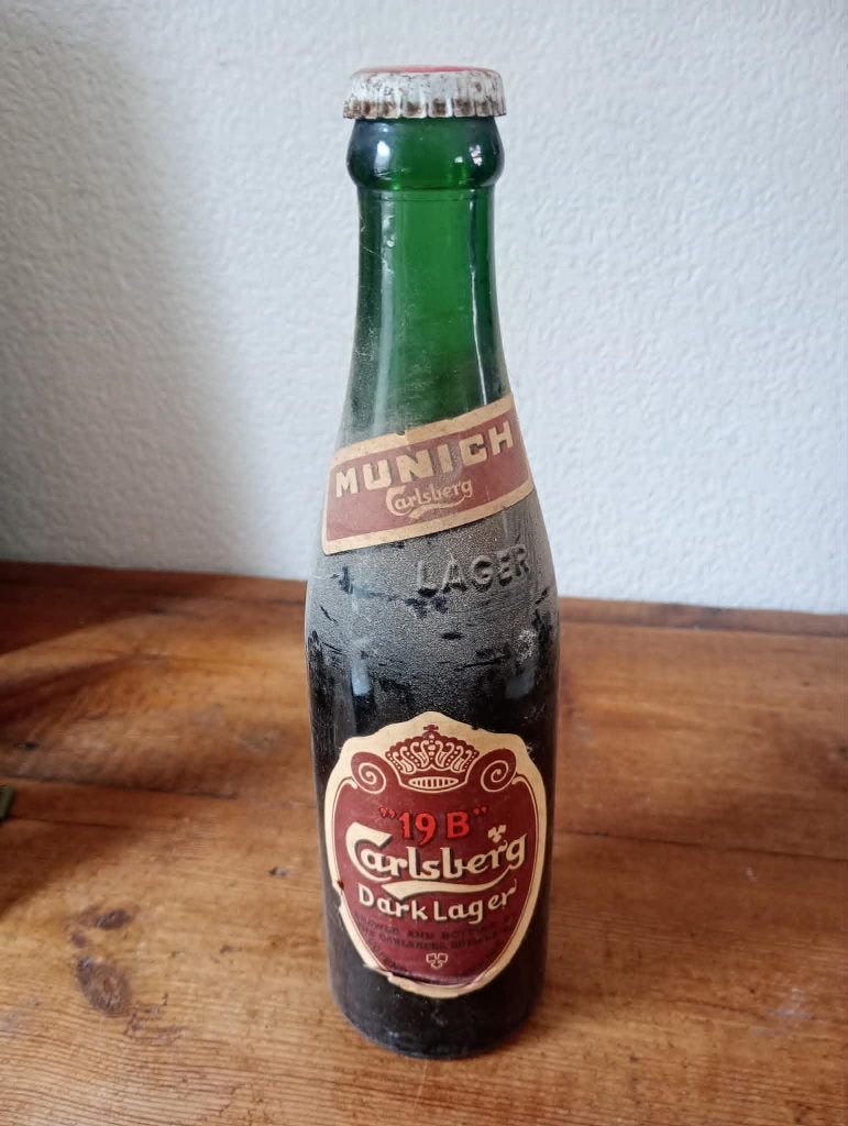 Brouwerij oud bier München Carlsberg fles gevuld, Verzamelen, Ophalen of Verzenden, Zo goed als nieuw, Flesje(s), Overige merken