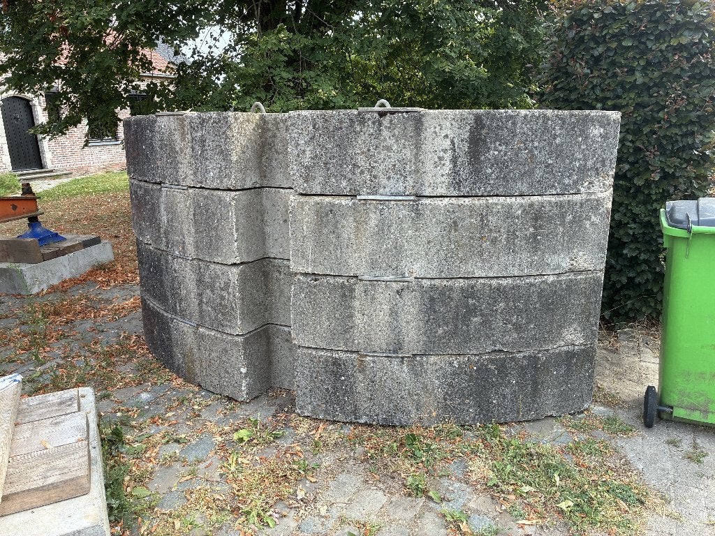 12 betonblokken Arcomet, Ophalen