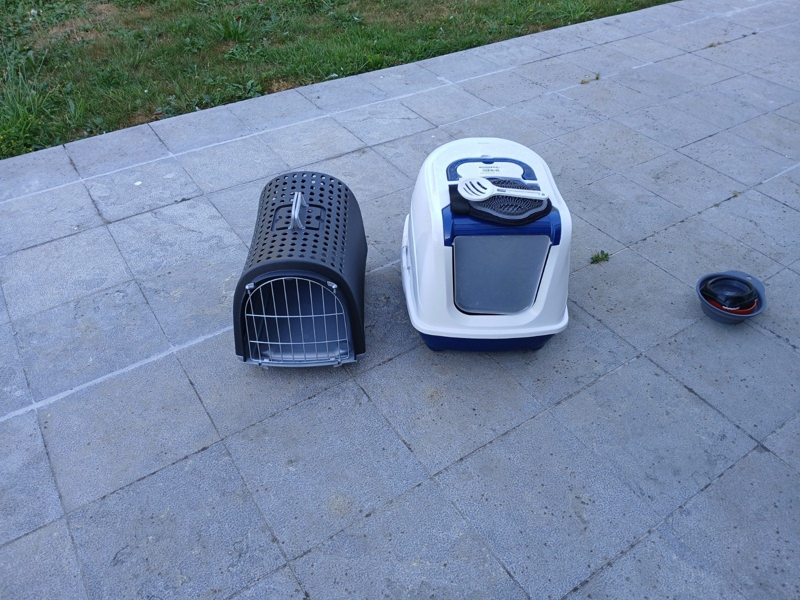 kattenbak en transportmand voor poes, Ophalen