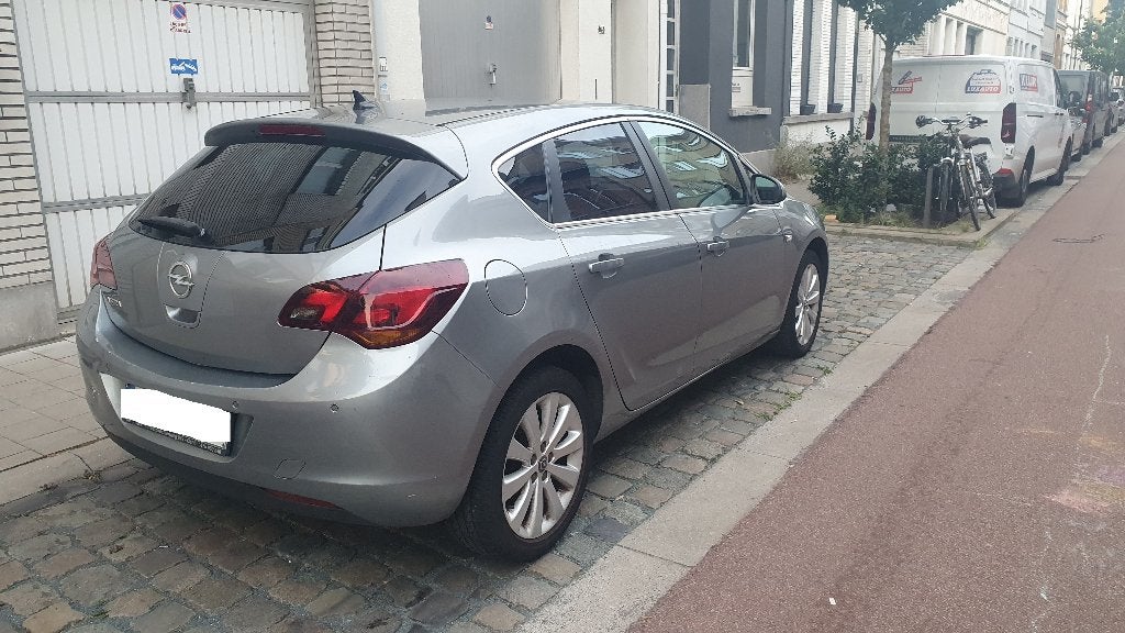 Opel Astsra 2011 1.4 benzine, Auto's, Euro 5, https://public.car-pass.be/vhr/6961b7e3-790f-4095-b165-0f588fc3e18f, 63 kW, 1396 cc