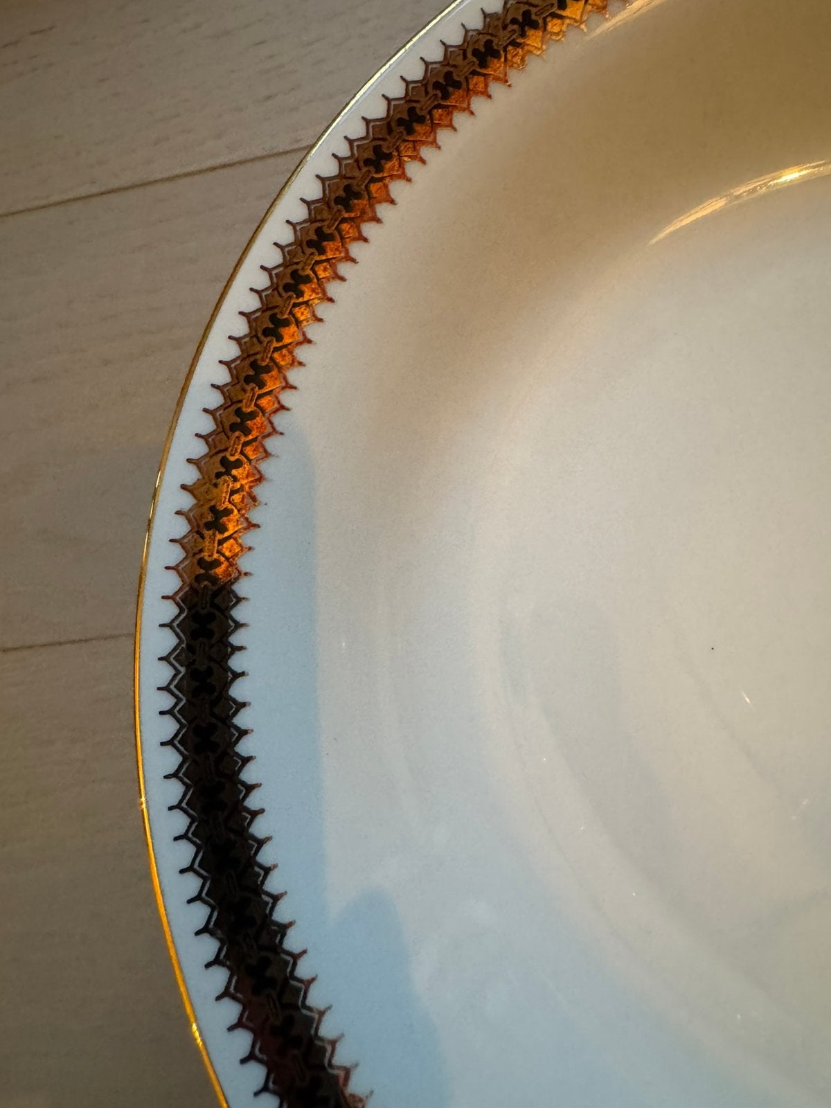 10 soepborden met gouden rand, Ophalen