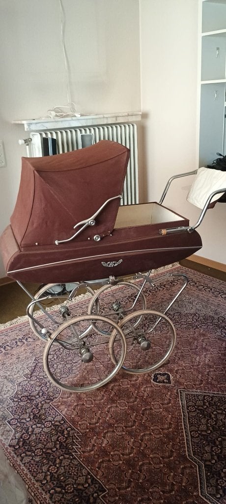 Kinderwagen jaren 60, Ophalen