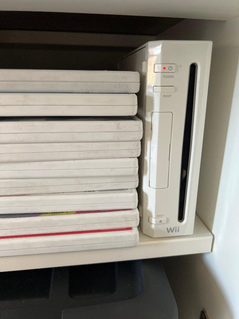 Wii te koop, Ophalen of Verzenden, Zo goed als nieuw, Met games