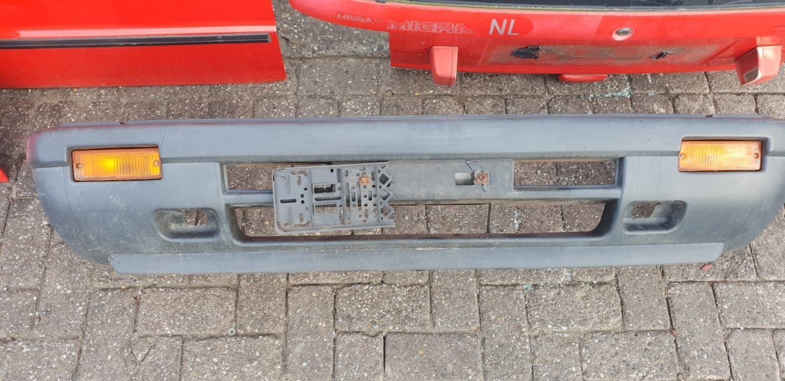 NISSAN MICRA VOORBUMPER BJ 1990 1992, -, Utilisé, -, Avant