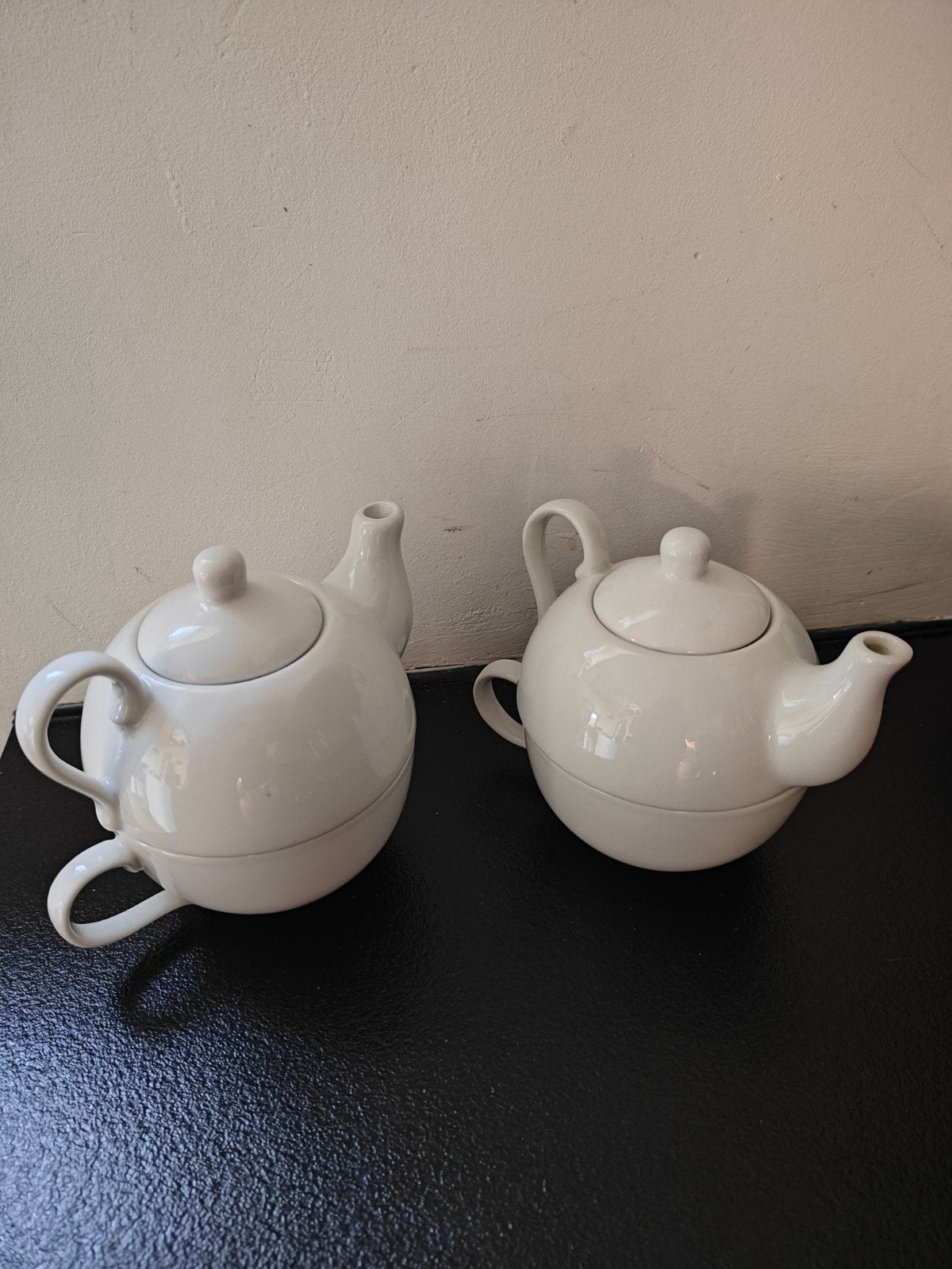 2 theetassen met schenkkan, Ophalen
