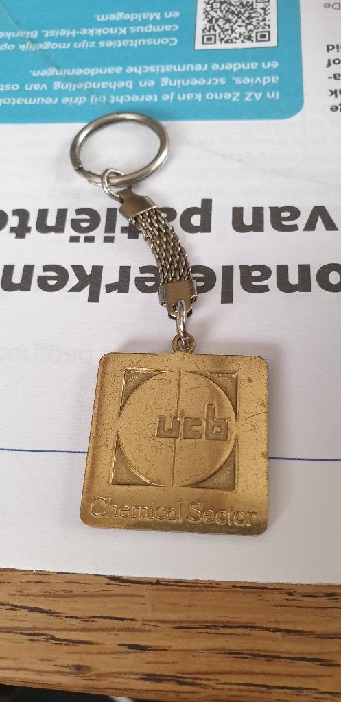 metalen UCB sleutelhanger, Ophalen, Zo goed als nieuw, Merk