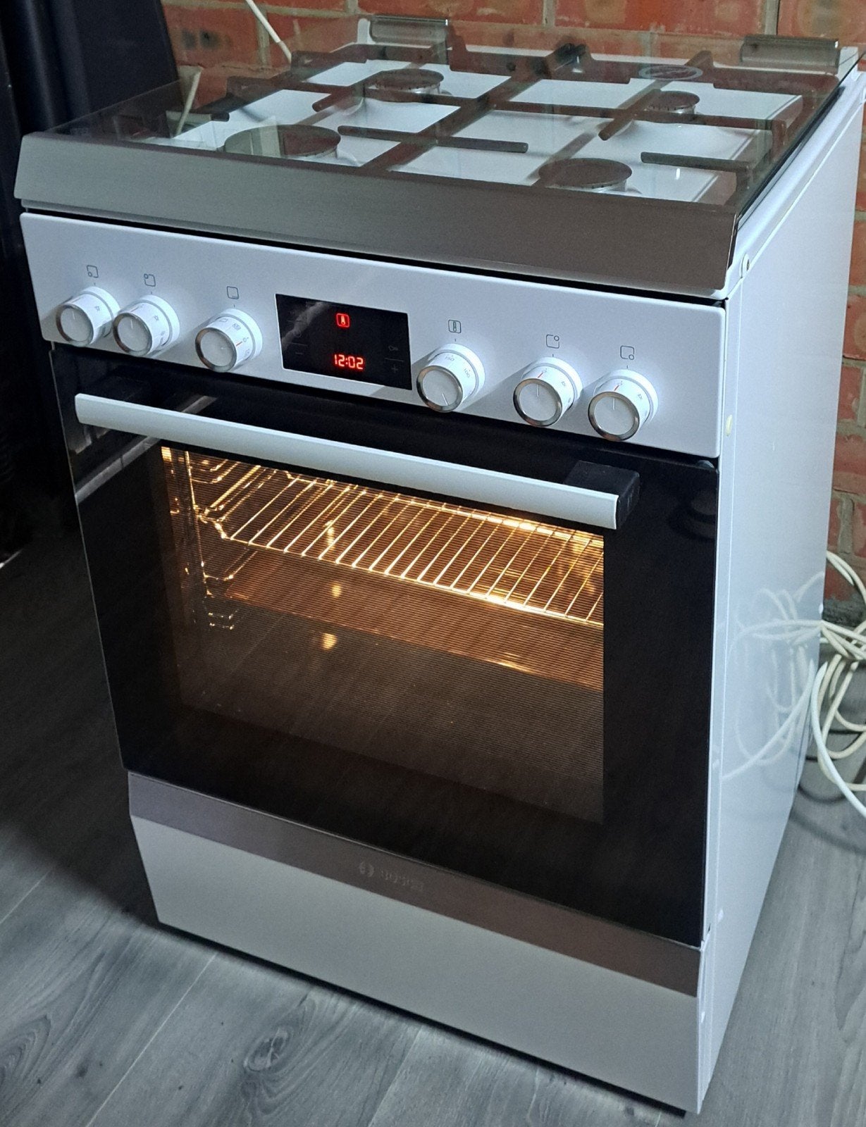 Gasfornuis met elektrische oven bosch, Ophalen