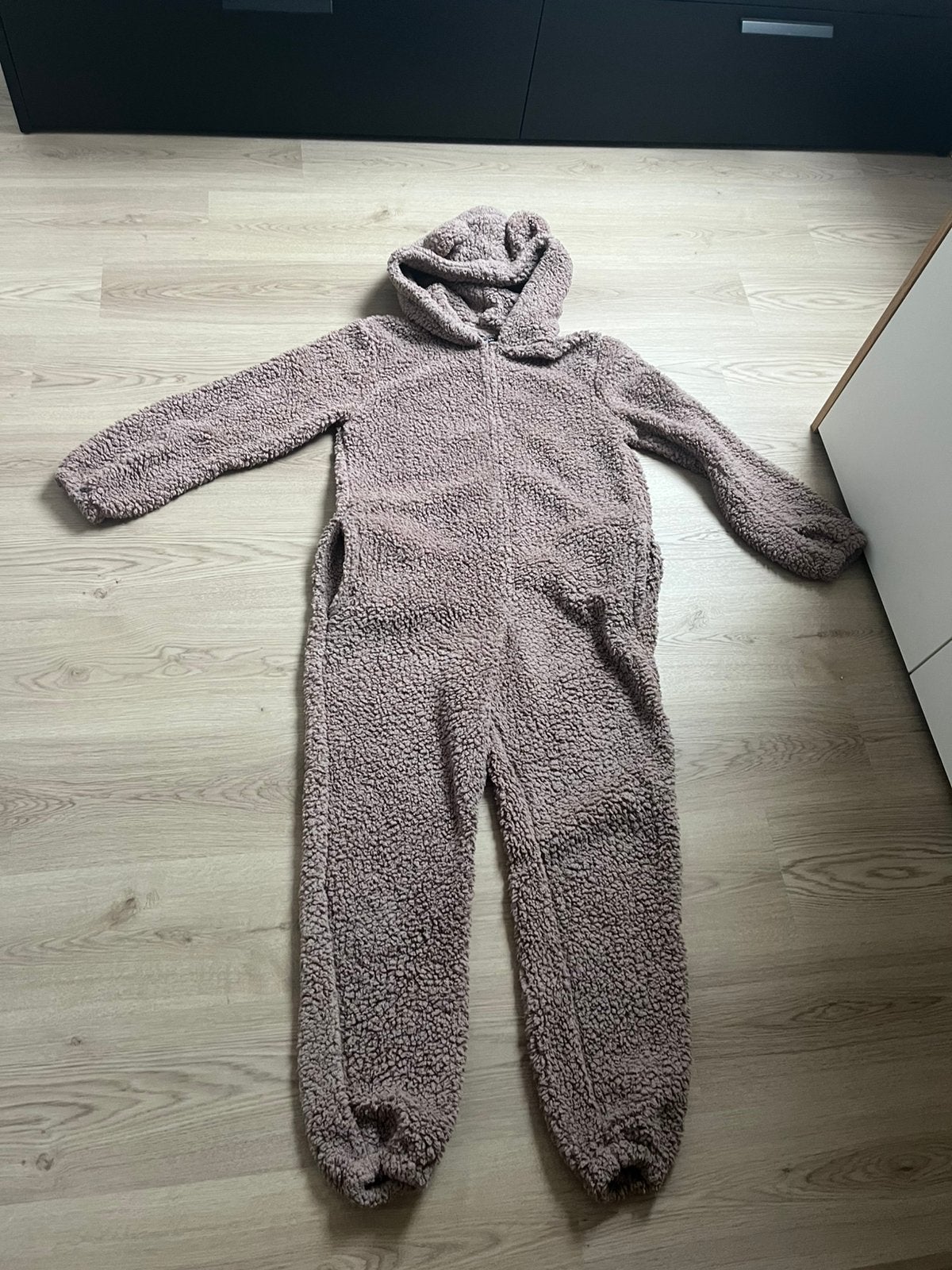 Onesie beer, Ophalen, Zo goed als nieuw