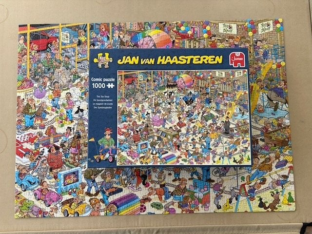 Jan Van Haastern - De speelgoedwinkel, Hobby en Vrije tijd, Denksport en Puzzels, Ophalen of Verzenden, 500 t/m 1500 stukjes, Zo goed als nieuw