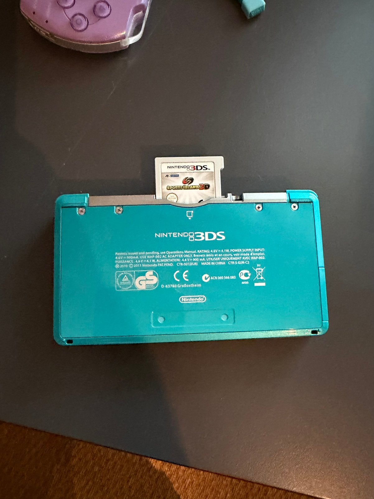 Nintendo 3DS Aqua Blue + lader + Sports Island 3D, Ophalen, Zo goed als nieuw, Blauw, Met games