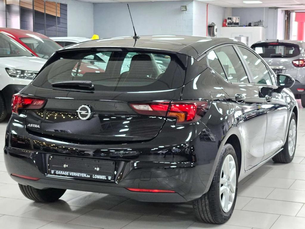 Opel Astra 1.2i Turbo Crply Cruise BiZone SIEGES Chauffants, Auto's, Stof, Gebruikt, 1199 cc, Zwart