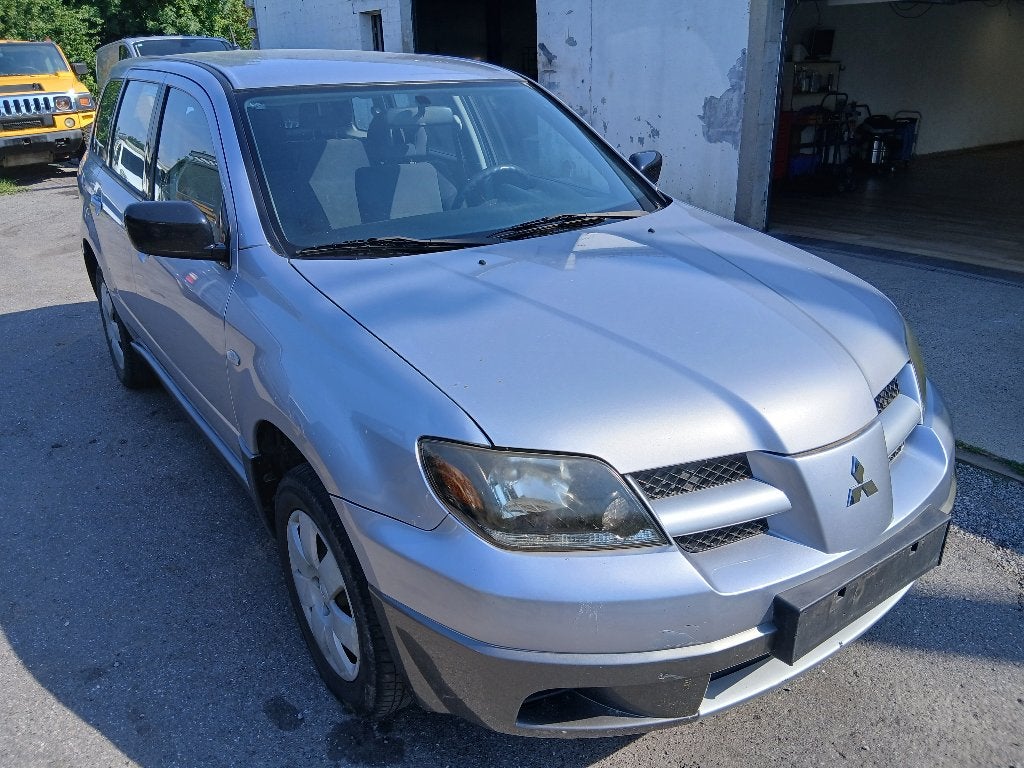 MITSUBISHI OUTLANDER 2.0 ess 2005 AIRCO/1MAIN/1.750 €, Auto's, Mitsubishi, 100 kW, Outlander, Elektrische ramen, Bedrijf