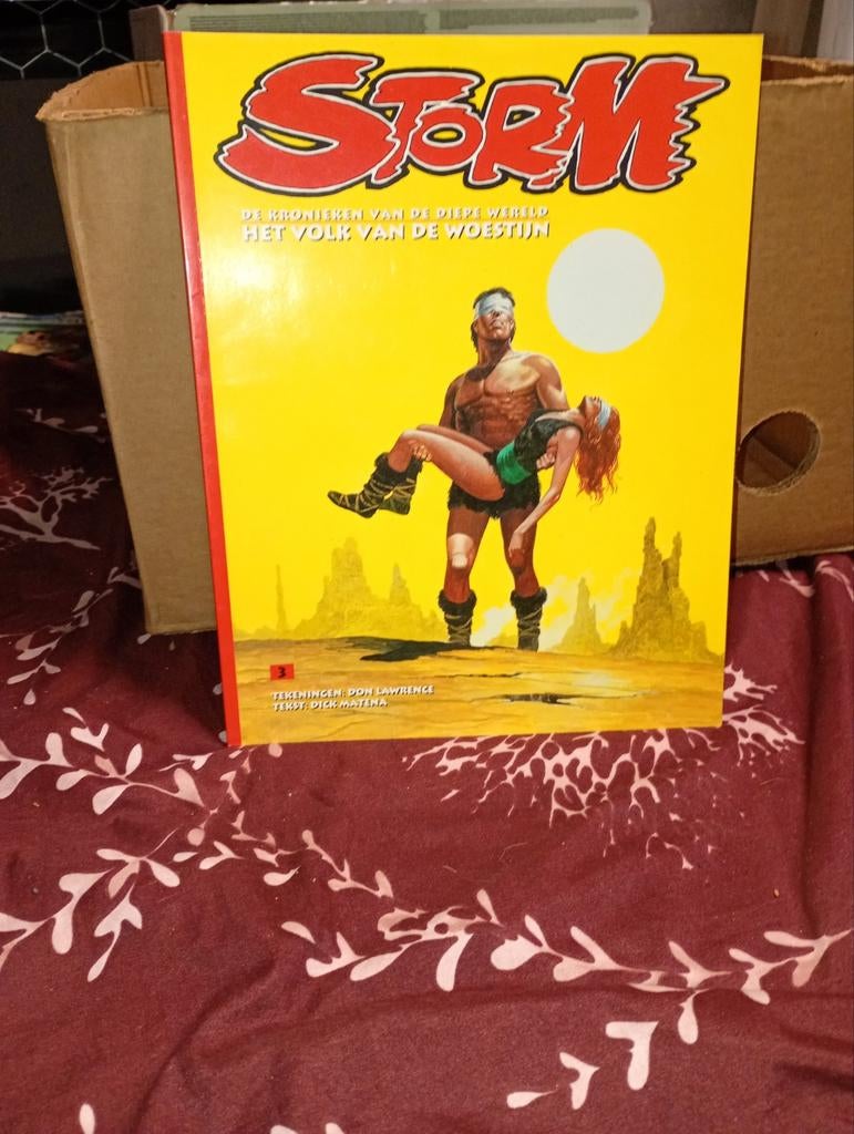 Couverture souple en couleur non lue de la série, STORM,, Une BD, Enlèvement ou Envoi, Comme neuf, Don Lawrence