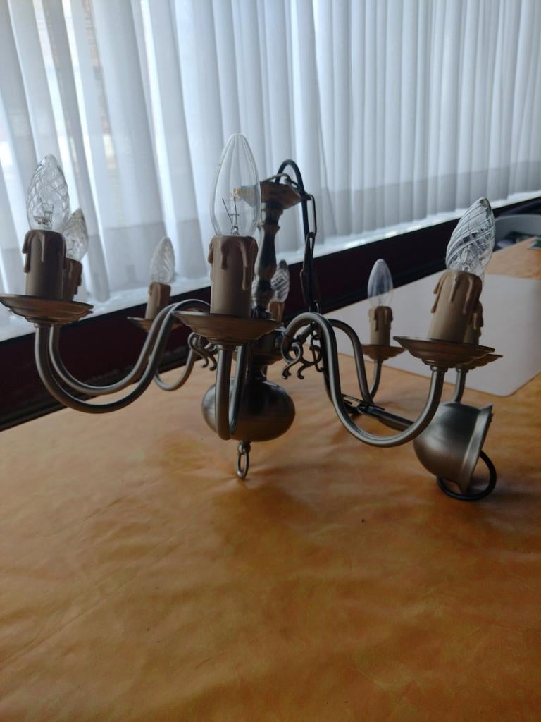Zilveren hanglamp, Ophalen