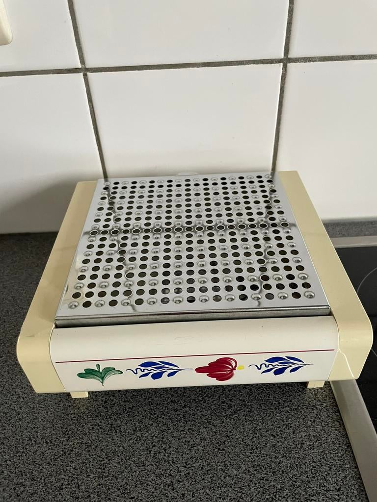 Brabants bont warmhoudplaatje vintage, Ophalen