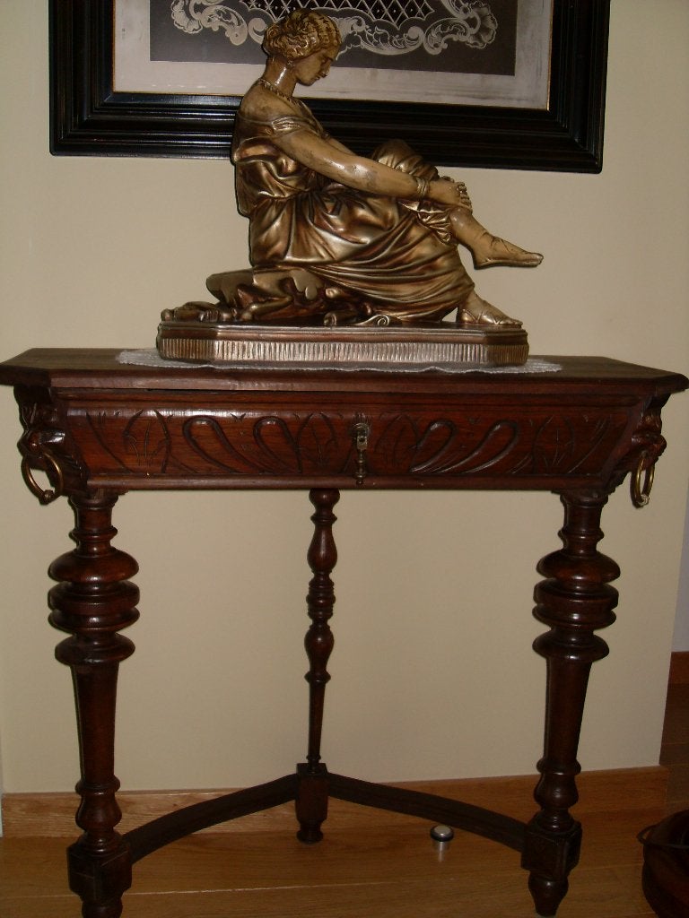 Driepoottafeltje (console), Enlèvement